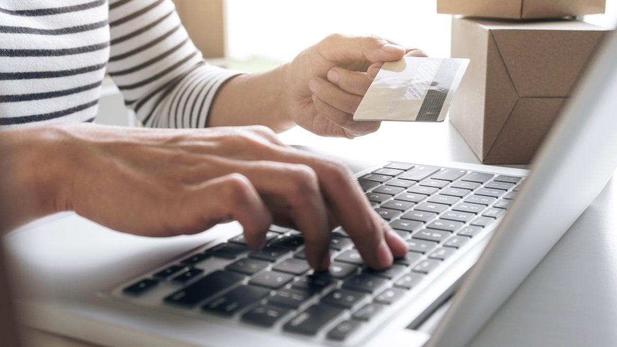 Woman's hands using credit card register and payments online shopping and customer service network connection market, using technology on laptop, Internet Online shopping or internet banking concept.