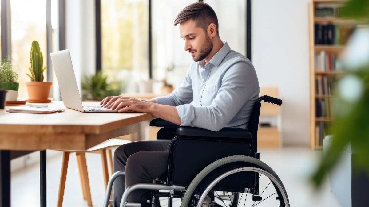 Virtual empowerment: wheelchair bound man's online success.