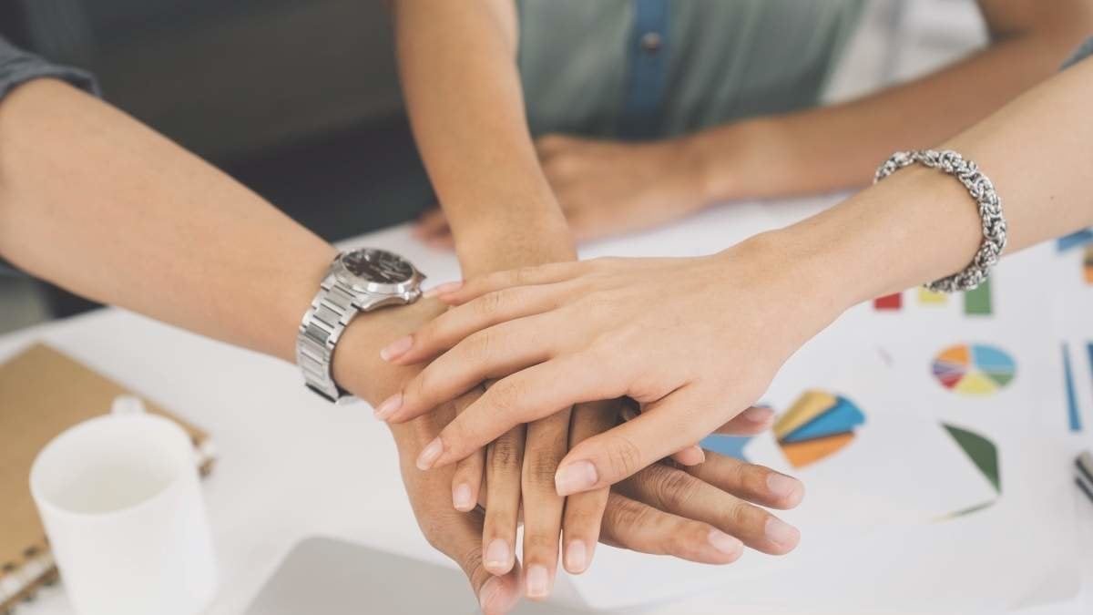 Business partners teamwork concept,Creative team, coworkers,teamwork Join Hands Partnership Concept