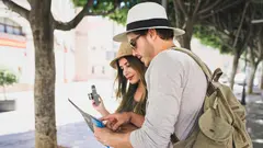 couple-of-tourists-looking-at-the-map (1)